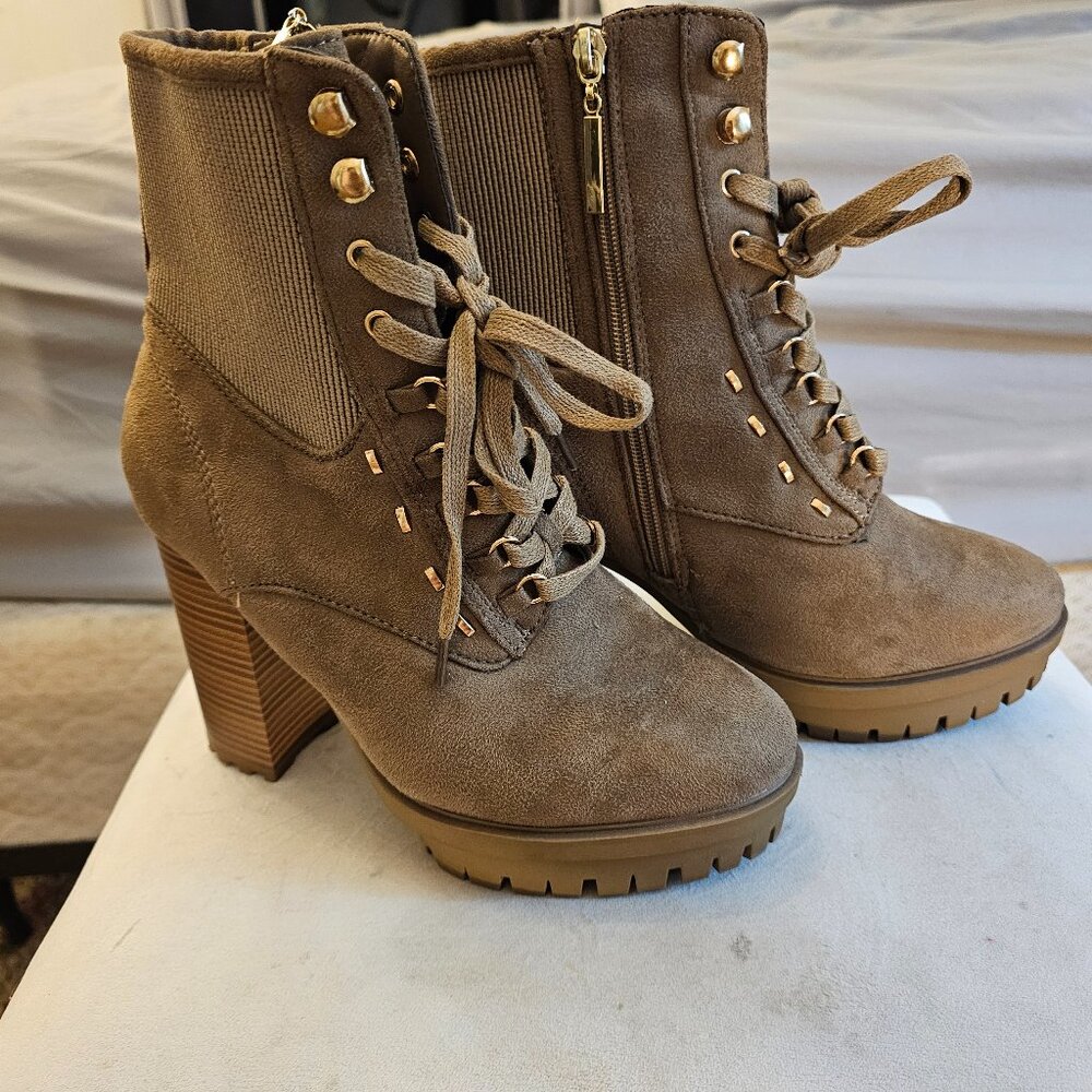 Tan boots with a heel